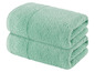 Zwei hellgrüne Handtücher.