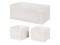 Drei weiße Aufbewahrungsboxen für den Schrank.