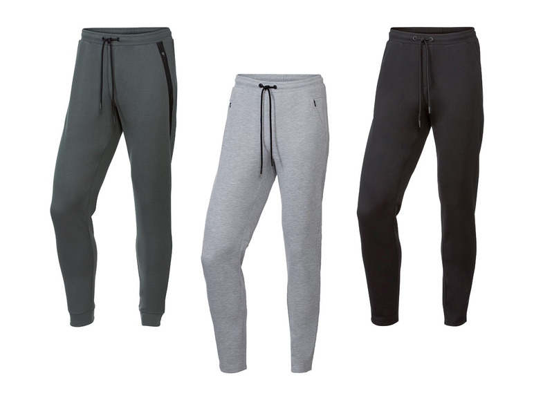 Drei Jogginghosen in Grau, Dunkelgrün und Schwarz.