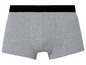 Graue Boxershorts mit schwarzem Bund.
