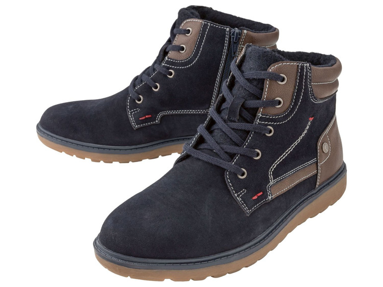 Zwei Paar dunkelblaue Wildlederstiefel mit Schnürsenkeln.