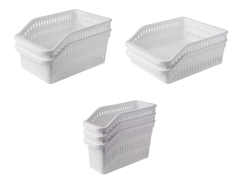 Drei weiße Aufbewahrungskörbe mit Löchern