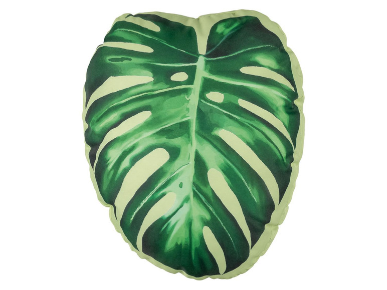 Ein Kissen mit Monstera-Blatt-Muster.