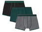 Drei Boxershorts in Schwarz, Dunkelgrün und Grau.