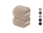 Zwei zusammengerollte beige Handtücher, andere Farben verfügbar.