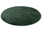 Runde, dunkelgrüne Badematte.