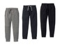 Drei Jogginghosen für Jungen, eine schwarze, eine graue und eine dunkelblaue mit dem Schriftzug 'Never Give Up'.