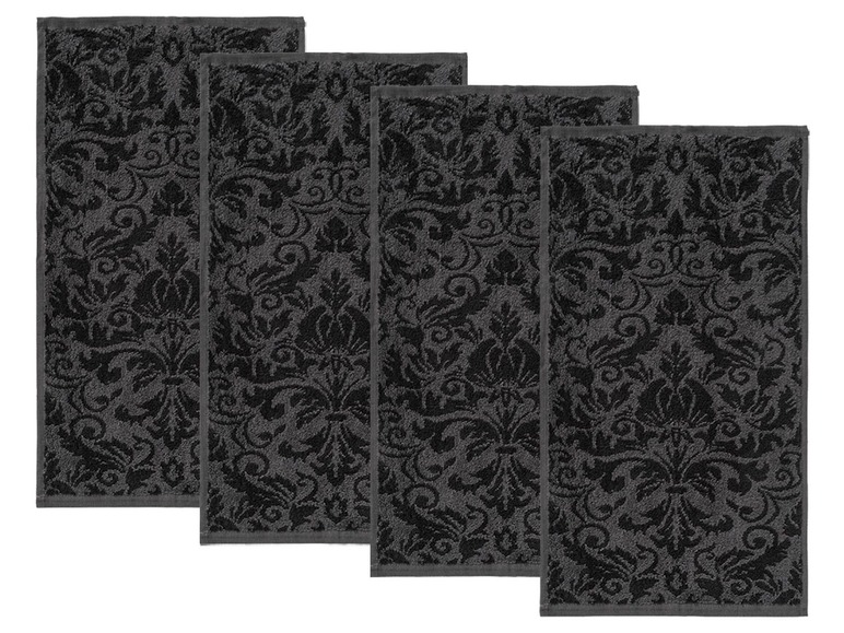 Vier schwarze Handtücher mit einem dunkelgrauen Damastmuster.