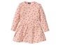 Rosa Kleid mit Herzchenmuster für Mädchen.