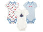 Drei Baby-Bodys mit Blumen, Streifen und einem Marienkäfer.