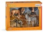 Schleich Wild Life Spielzeugset mit Löwe, Zebra, Elefant und Schimpanse.