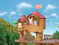 Sylvanian Families Spielzeug mit einem Baumhaus und Tierfiguren.