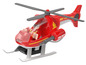 Ein roter Spielzeug-Hubschrauber mit einem Feuerwehrmann und einer Wasserpistole.
