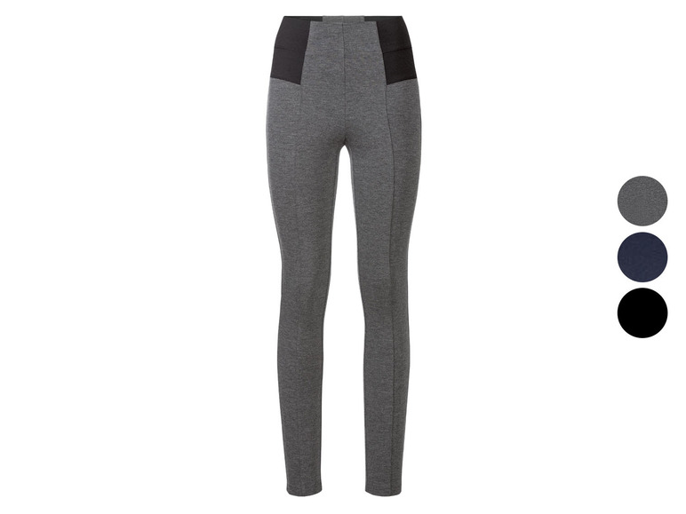 Graue Leggings mit schwarzen Details.