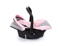 Ein rosa Baby-Autositz mit einem Griff.