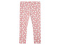 Rosa Leggings mit weißem Blumenmuster.