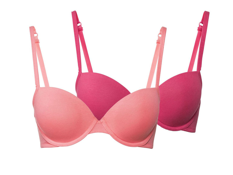 Zwei rosafarbene BHs mit glatten Cups.