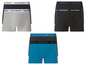 Drei Paar Bruno Banani Boxershorts in Grau, Schwarz und Blau.
