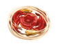 Ein rotes und goldenes Beyblade-Spielzeug.