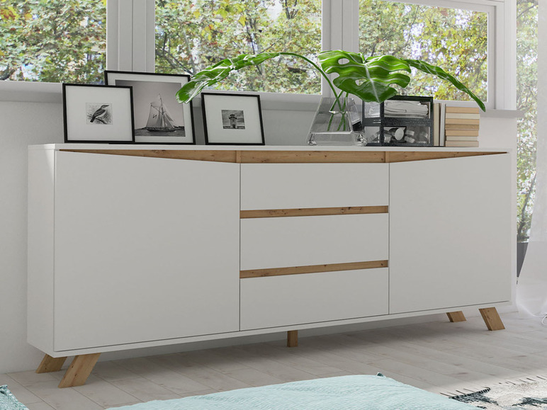 Weiße Kommode mit Holzdetails und zwei Türen.