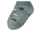 Grüne Socken mit Fischmuster.