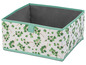 Aufbewahrungsbox mit grünem Blatt-Muster.