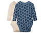 Zwei Baby-Bodys mit langen Ärmeln, einer uni und einer mit 'HI' Print.