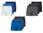 Sieben Boxershorts, darunter weiße, graue, blaue und dunkelblaue mit 'N3V3R STOP' darauf.