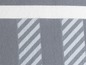 Gewebter Stoff mit weißen Streifen.