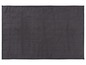 Dunkelgraue Badematte mit Gittermuster.