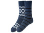 Zwei Paar blaue Wollsocken mit skandinavischem Muster und Anti-Rutsch-Punkten.