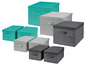 Aufbewahrungsboxen in Türkis und Grau mit Chevron-Muster.