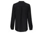 Schwarze Bluse mit langen Ärmeln.