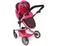 Rosa Kinderwagen mit schwarzen Punkten und Ablagekorb.