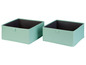 Zwei hellgrüne Aufbewahrungsboxen.