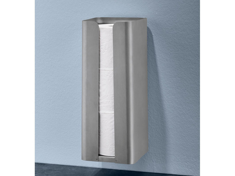 Ein Wandhalter für Toilettenpapier mit drei Rollen.