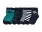 Sechs Paar Socken für Jungen mit Streifen und Dinosauriern.