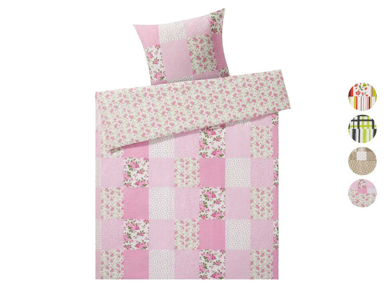 Ein rosa Bettbezug mit Blumenmuster und Patchwork-Design.