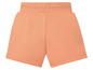 Peachfarbene Baumwollshorts.