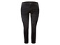 Schwarze Skinny Jeans.