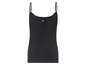 Schwarzes Tanktop mit Spaghettiträgern.