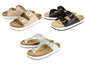 Drei Paar Sandalen mit Schnallen in Beige, Schwarz und Grau.