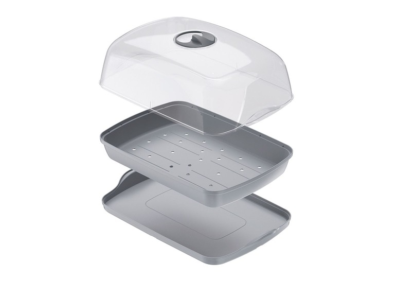 Ein transparentes Gewächshaus mit zwei grauen Tabletts.