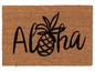 Eine Kokosmatte mit 'Aloha' und einem Ananas.