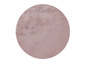 Runder, rosafarbener Plüschteppich.