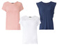 Drei Shirts mit Spitzendetails: rosa, weiß und dunkelblau.