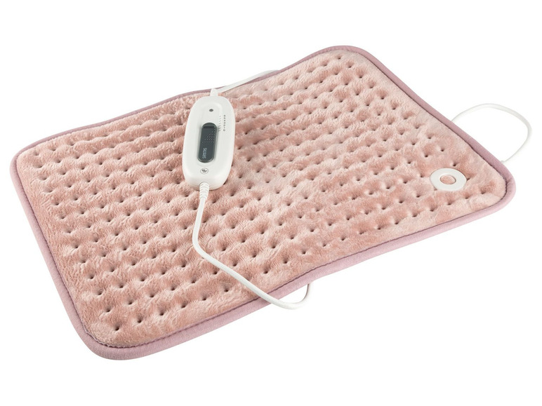 Eine rosa Heizdecke mit Fernbedienung.