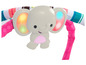 Ein grauer Elefant mit leuchtenden Ohren, befestigt an einem rosa und grünen Aktivitätsspielzeug.