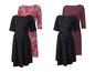 Zwei Schwangerschaftskleider: ein schwarzes mit weißen Punkten, ein rosa gestreiftes und ein rosa mit Blumenmuster.