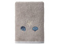 Beige Handtuch mit Muscheln und einem Stern